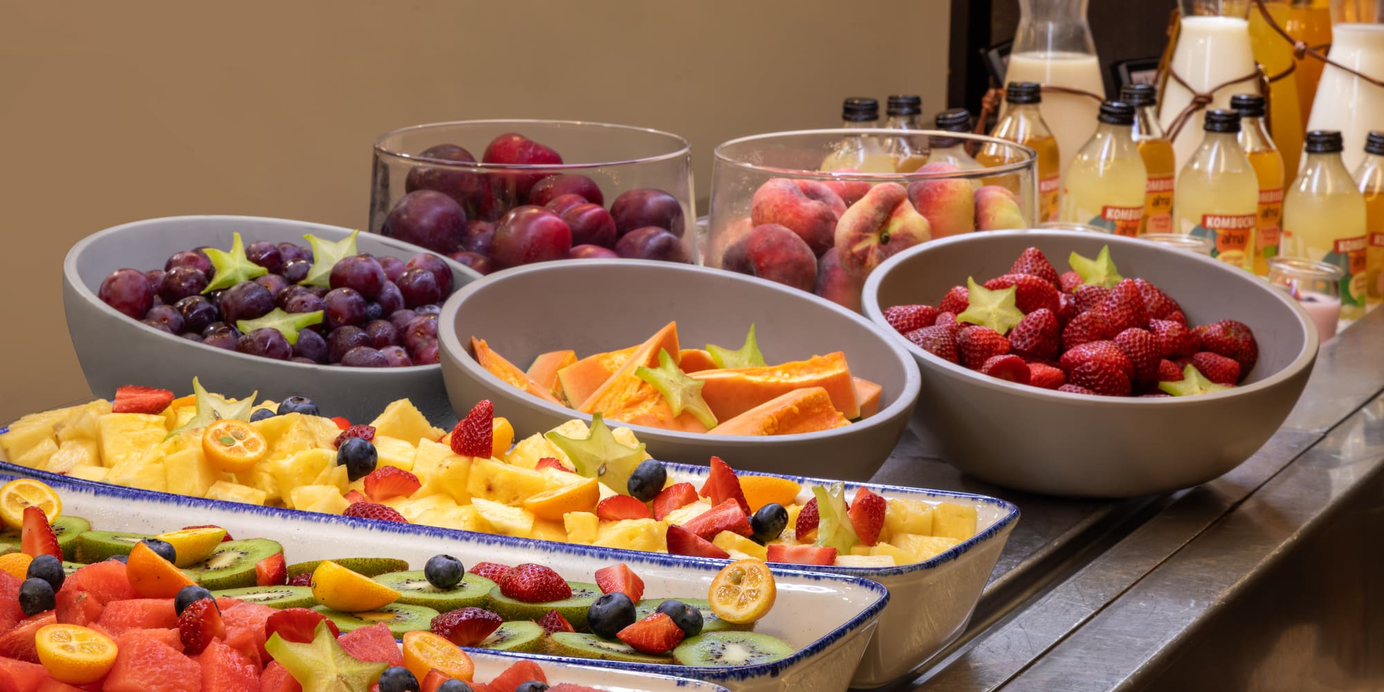 a group of bowls of fruit