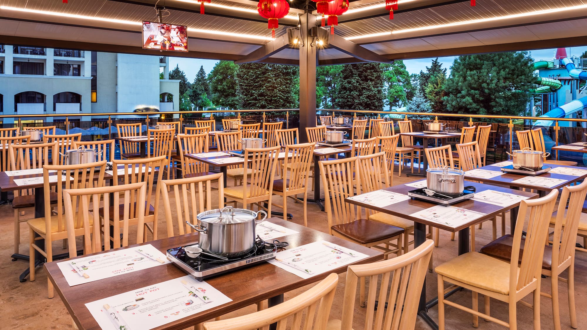 a restaurant with tables and chairs