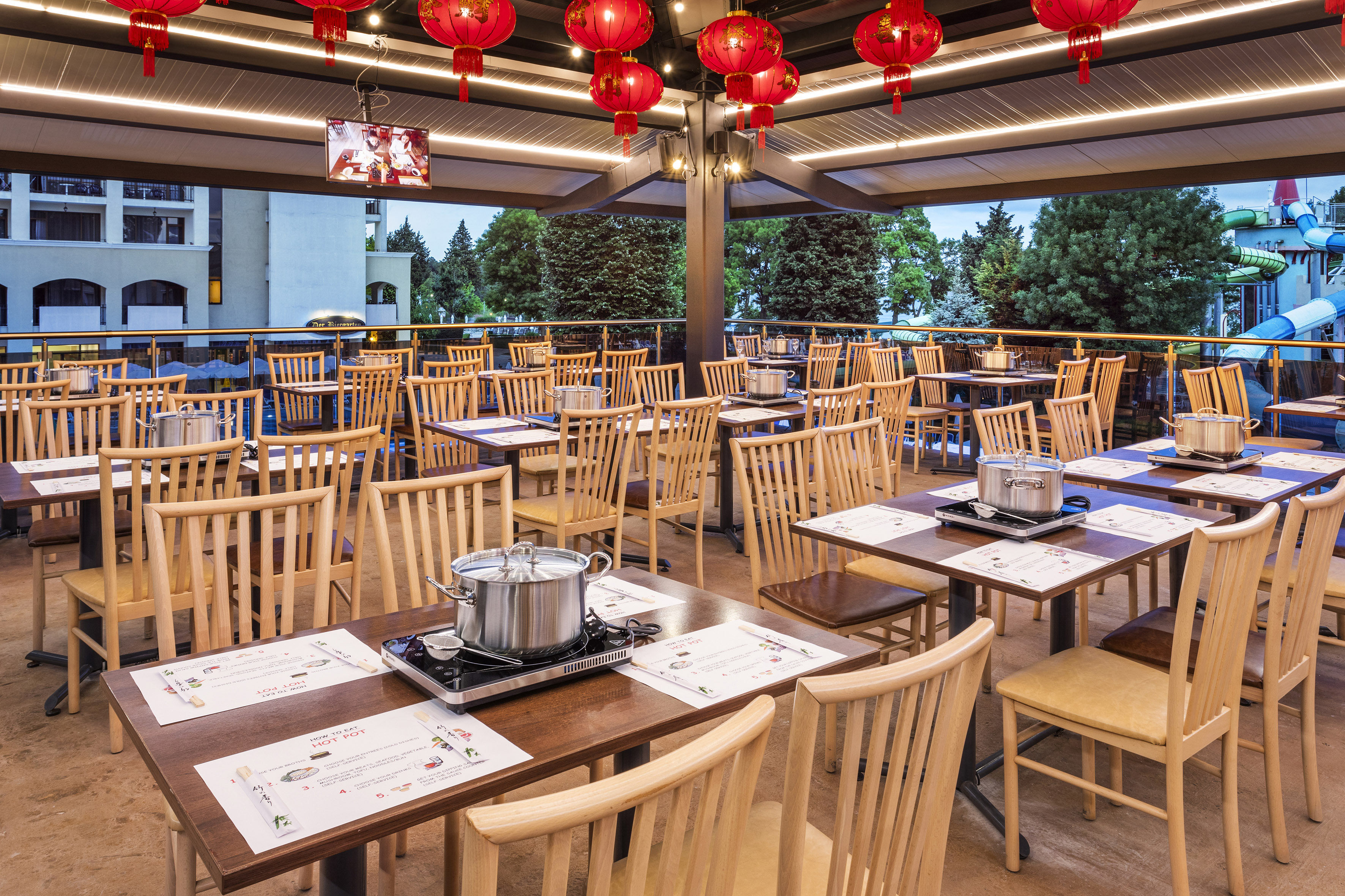 a restaurant with tables and chairs