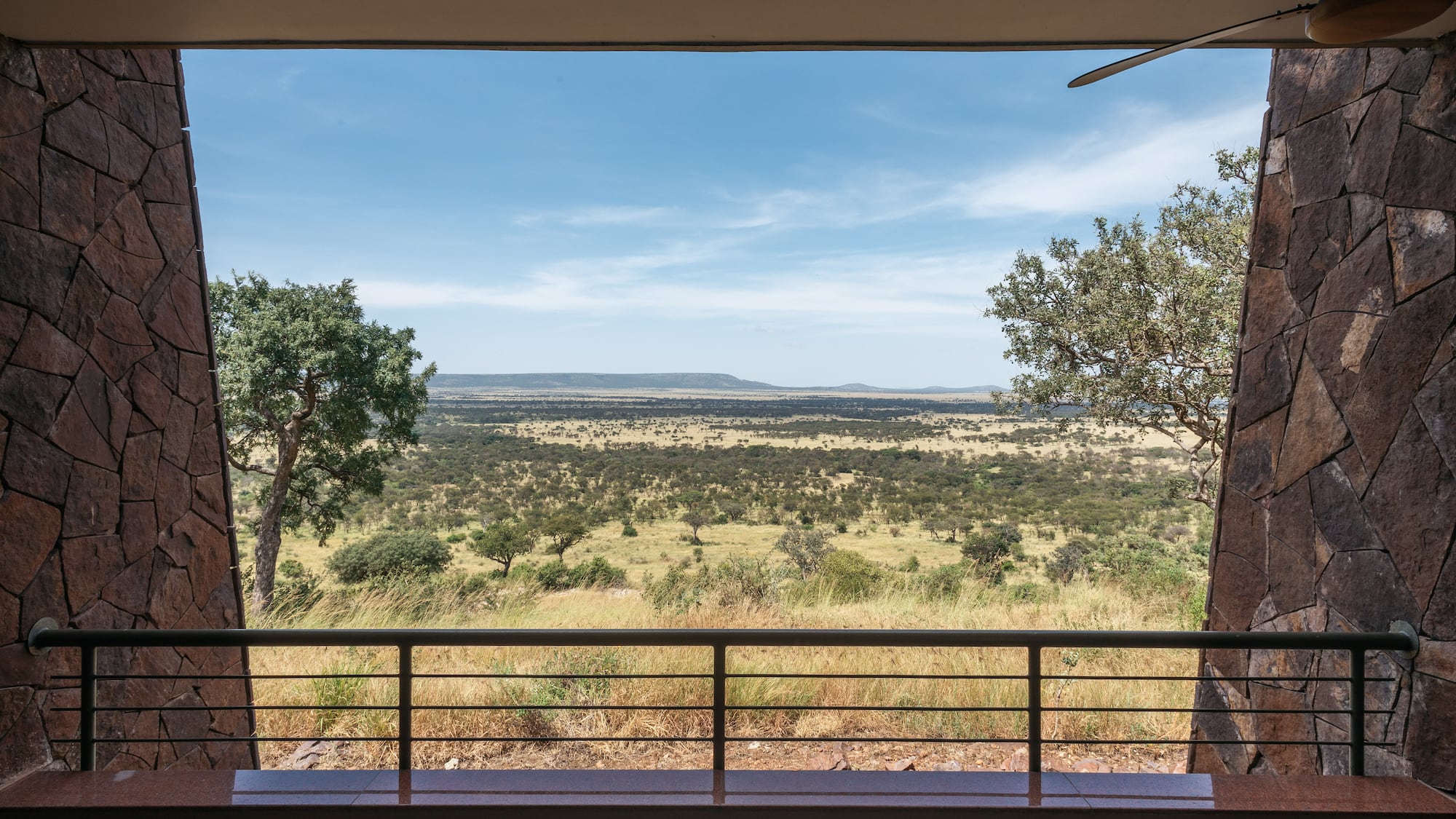 a view of a landscape from a balcony