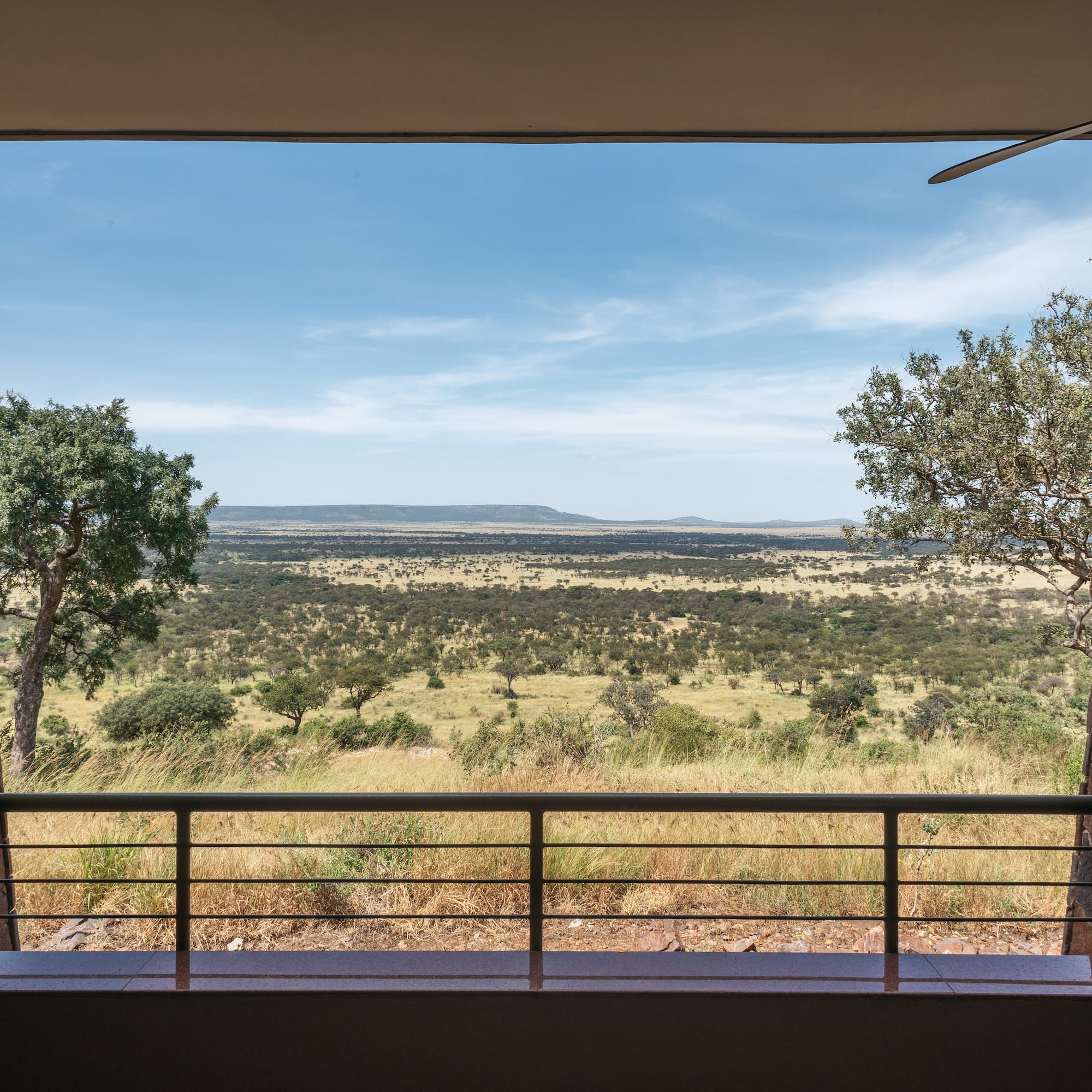a view of a landscape from a balcony