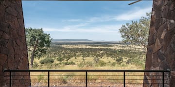 a view of a landscape from a balcony