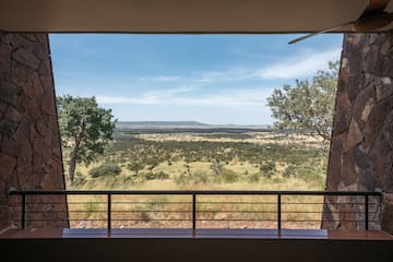 a view of a landscape from a balcony