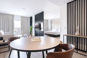 a room with a table and chairs