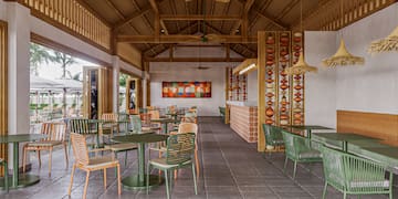 a room with tables and chairs