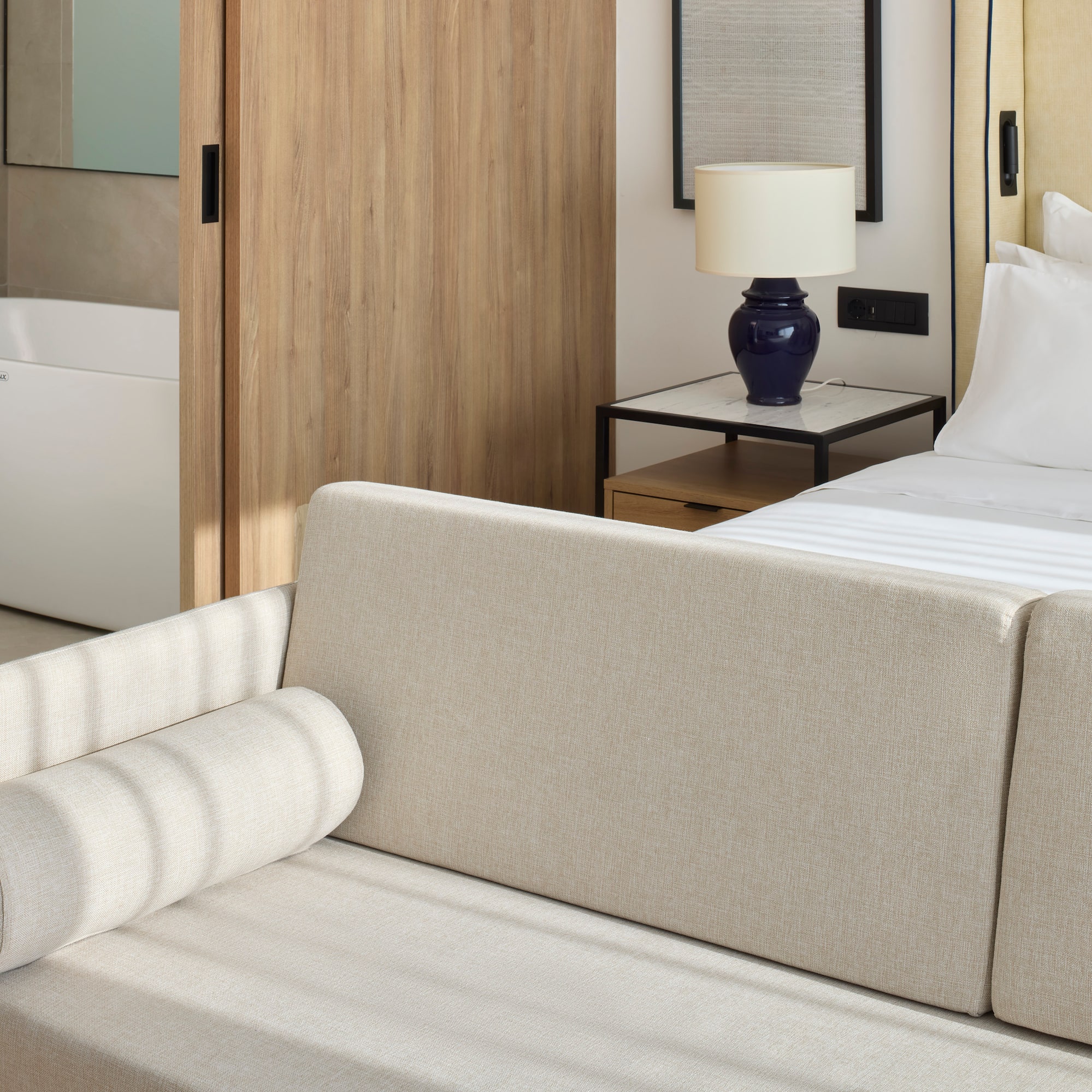 a couch in a hotel room