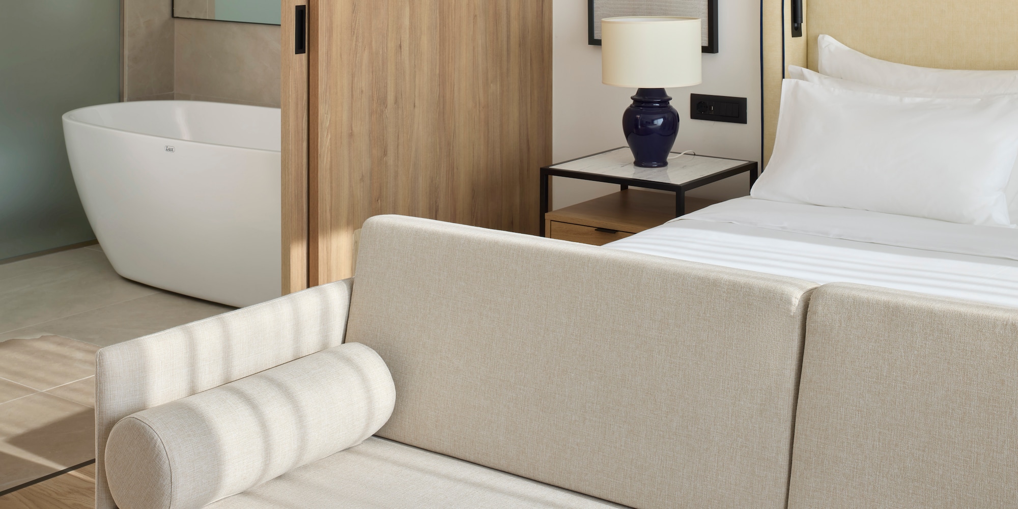 a couch in a hotel room