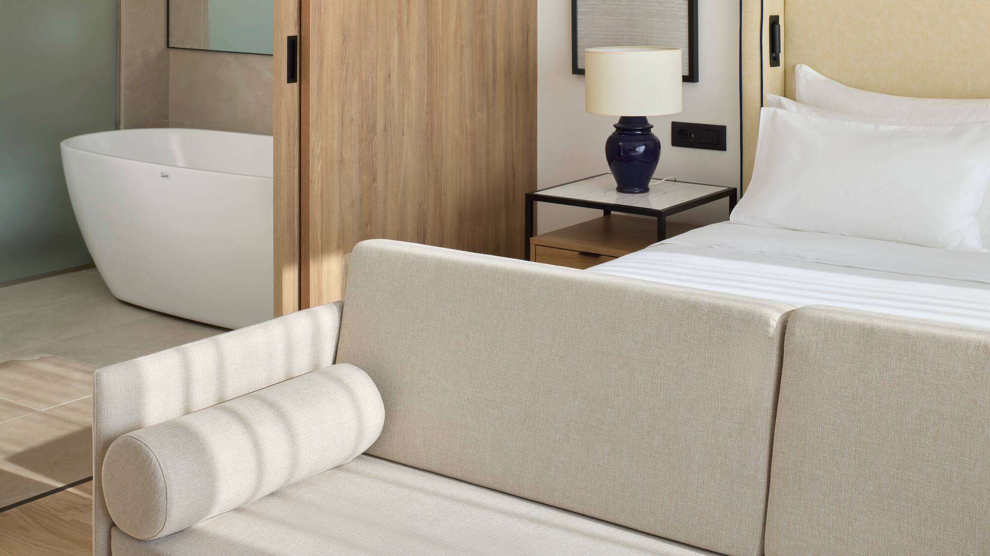 a couch in a hotel room