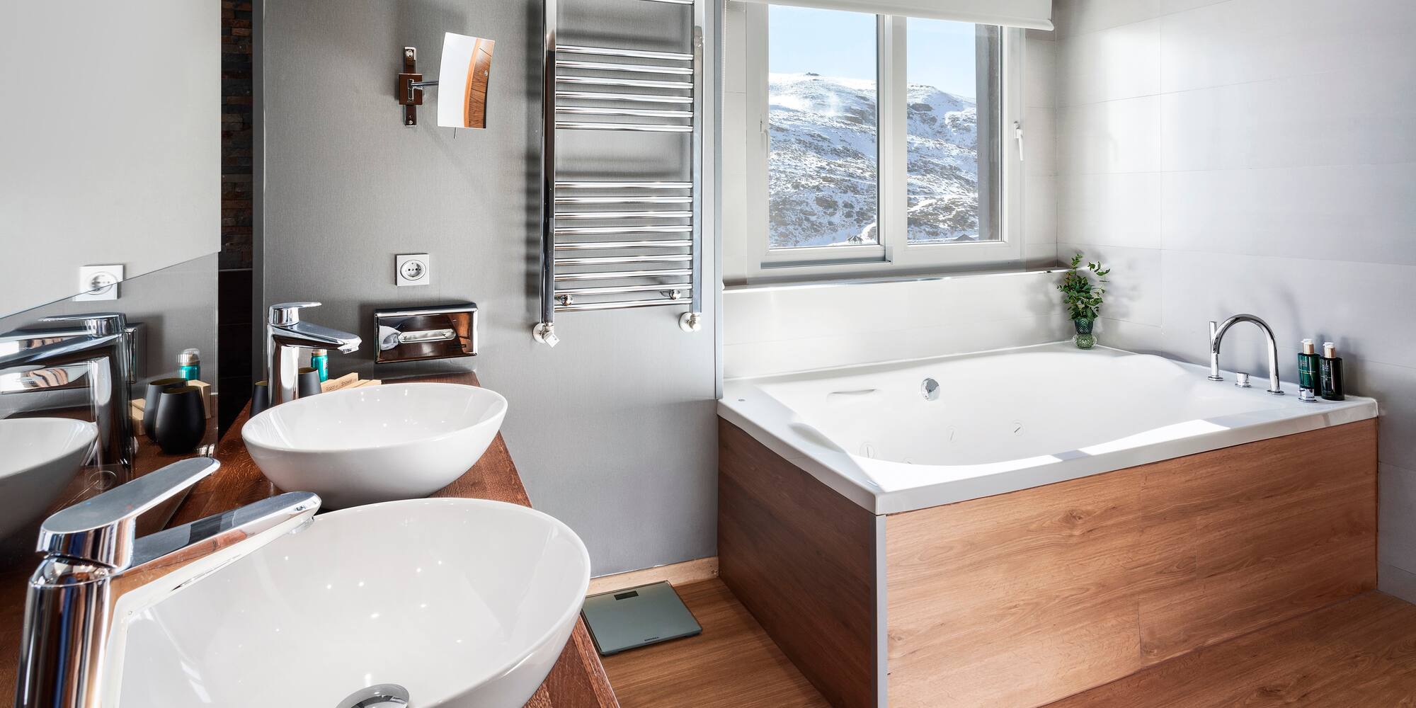 a bathroom with a tub and sink