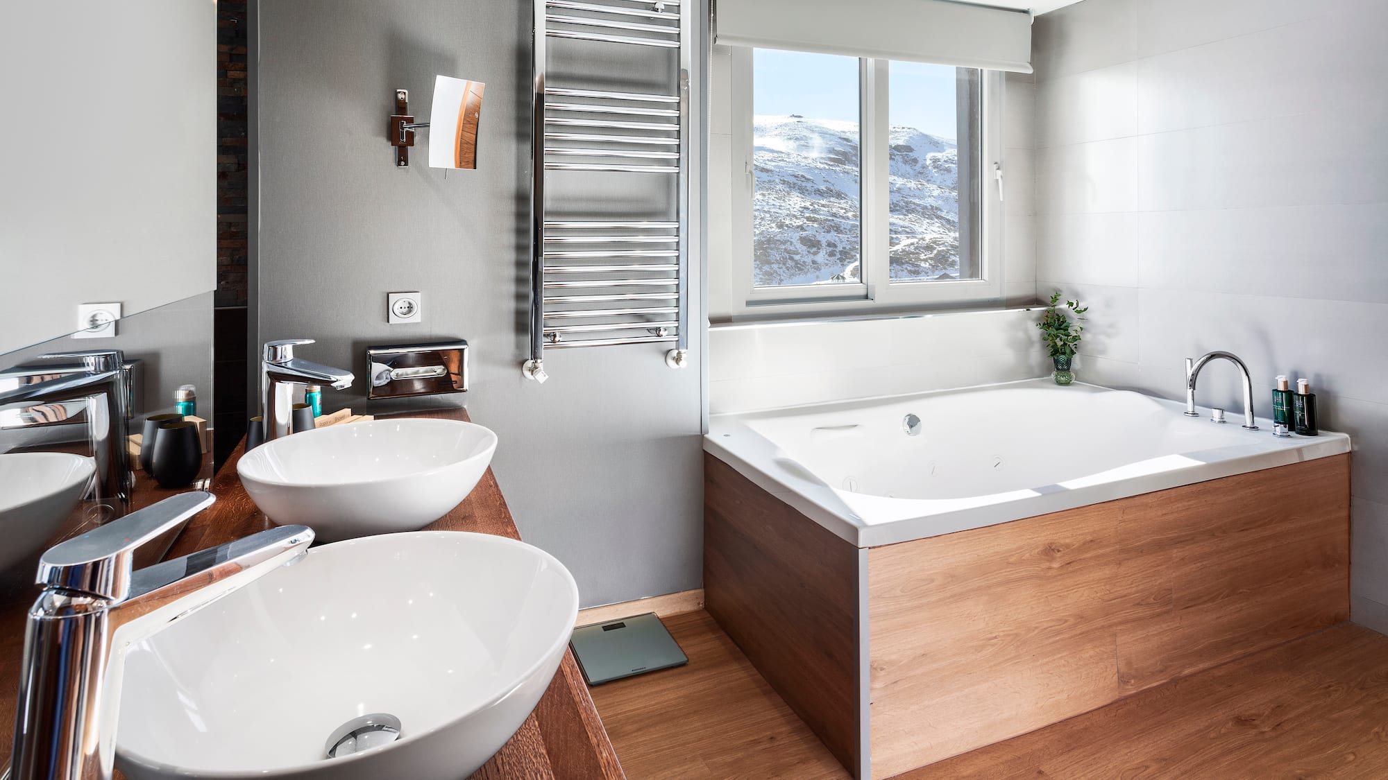 a bathroom with a tub and sink