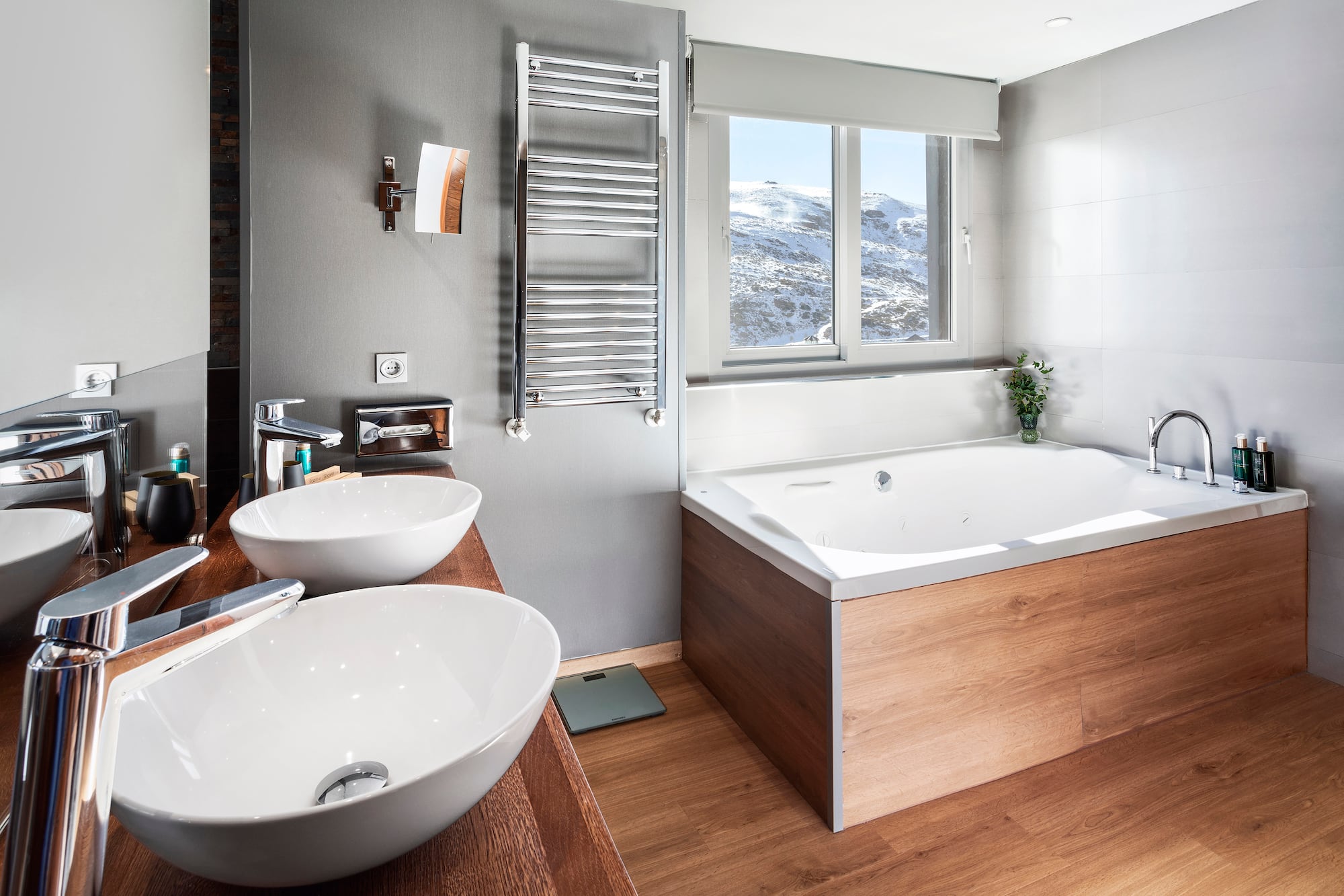 a bathroom with a tub and sink