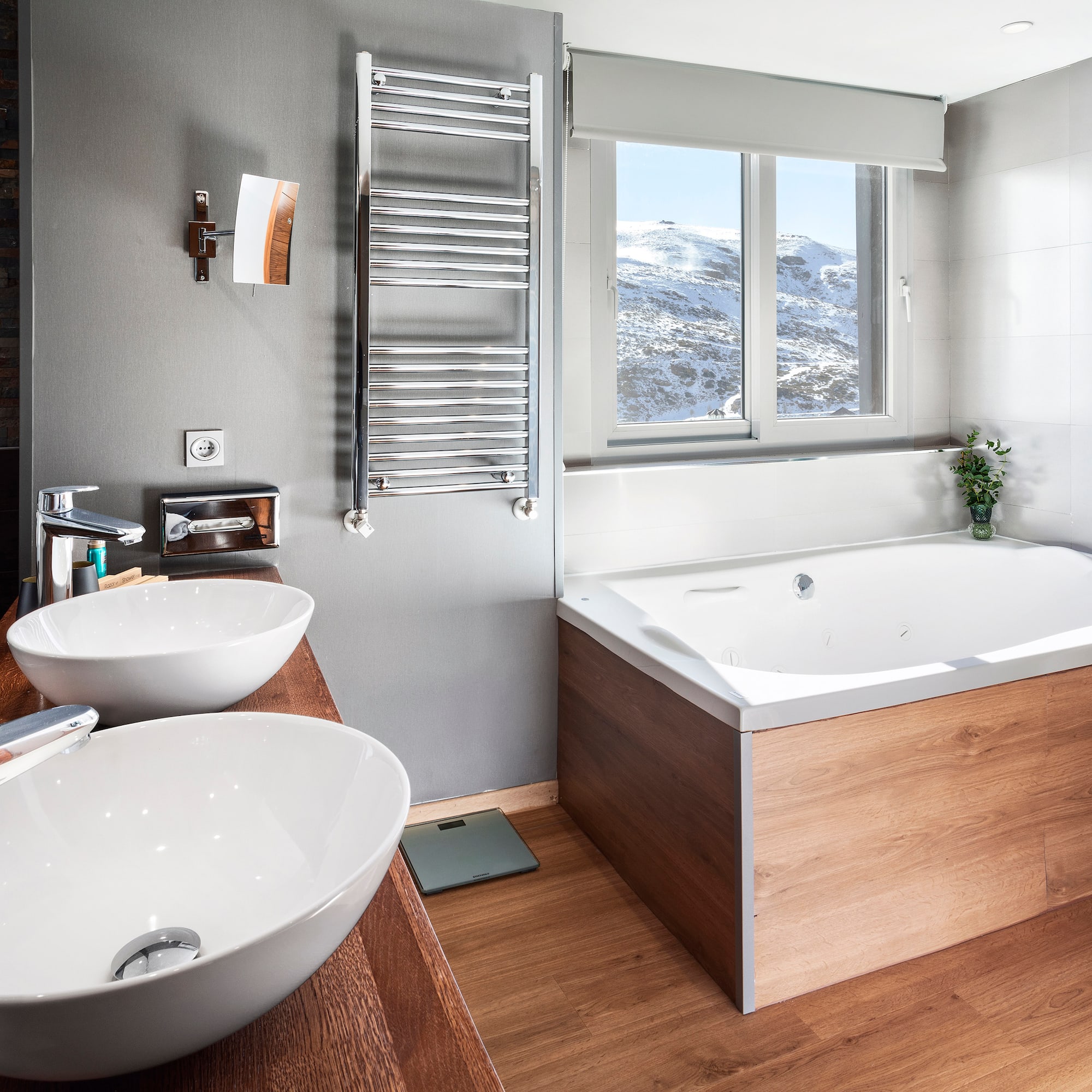 a bathroom with a tub and sink