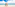 Couple walking hand-in-hand on a tropical beach with turquoise ocean.