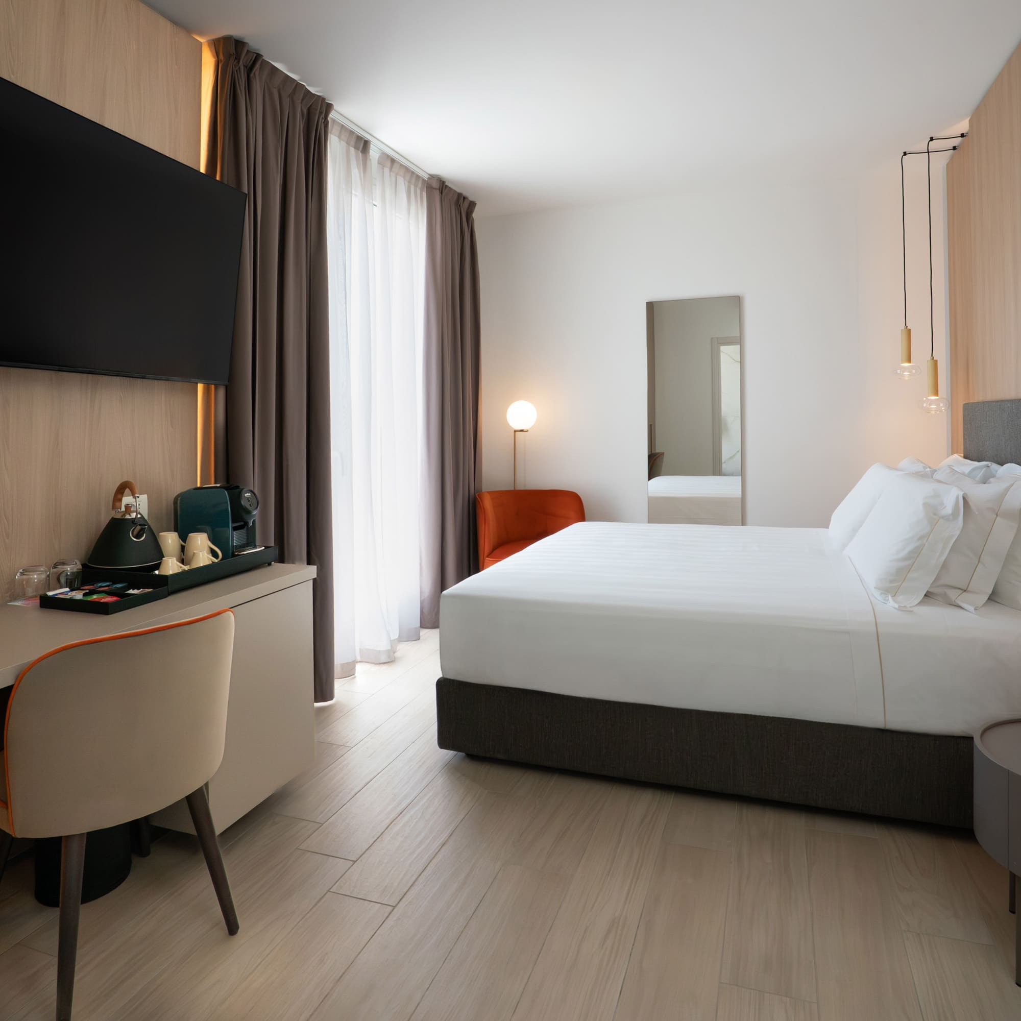 a room with a bed and a desk