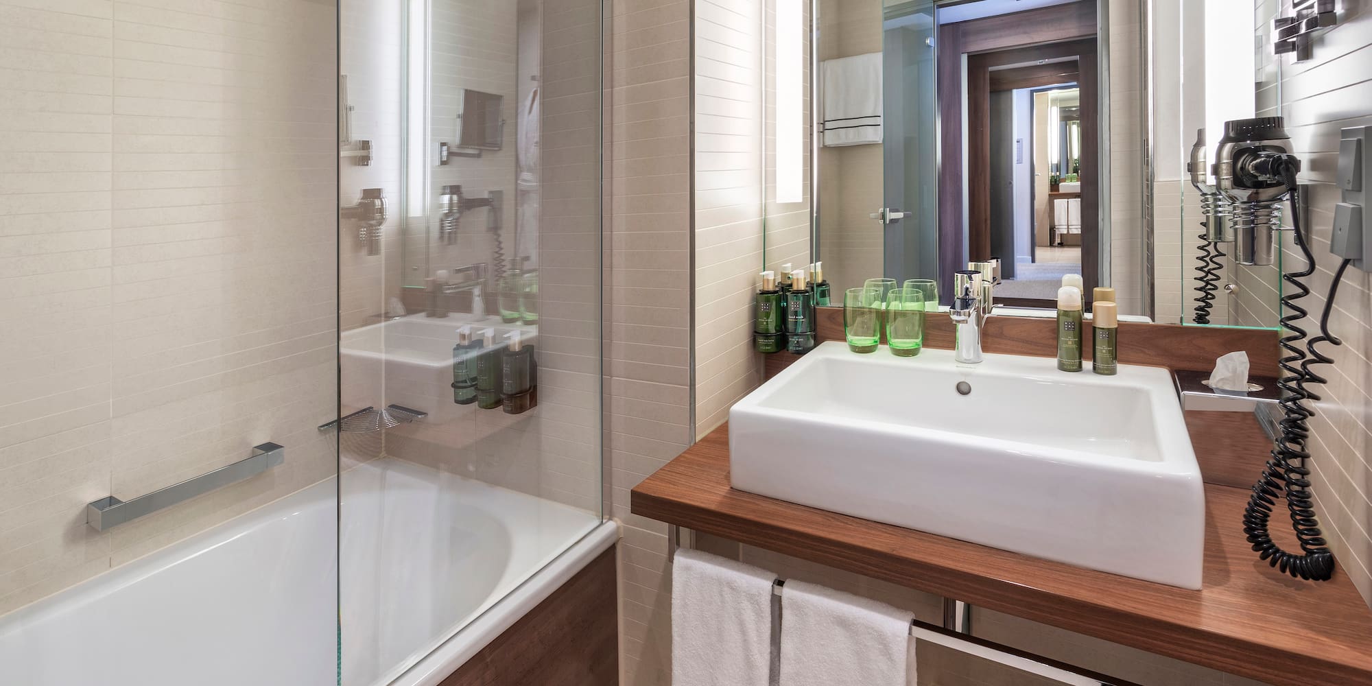 a bathroom with a sink and a shower