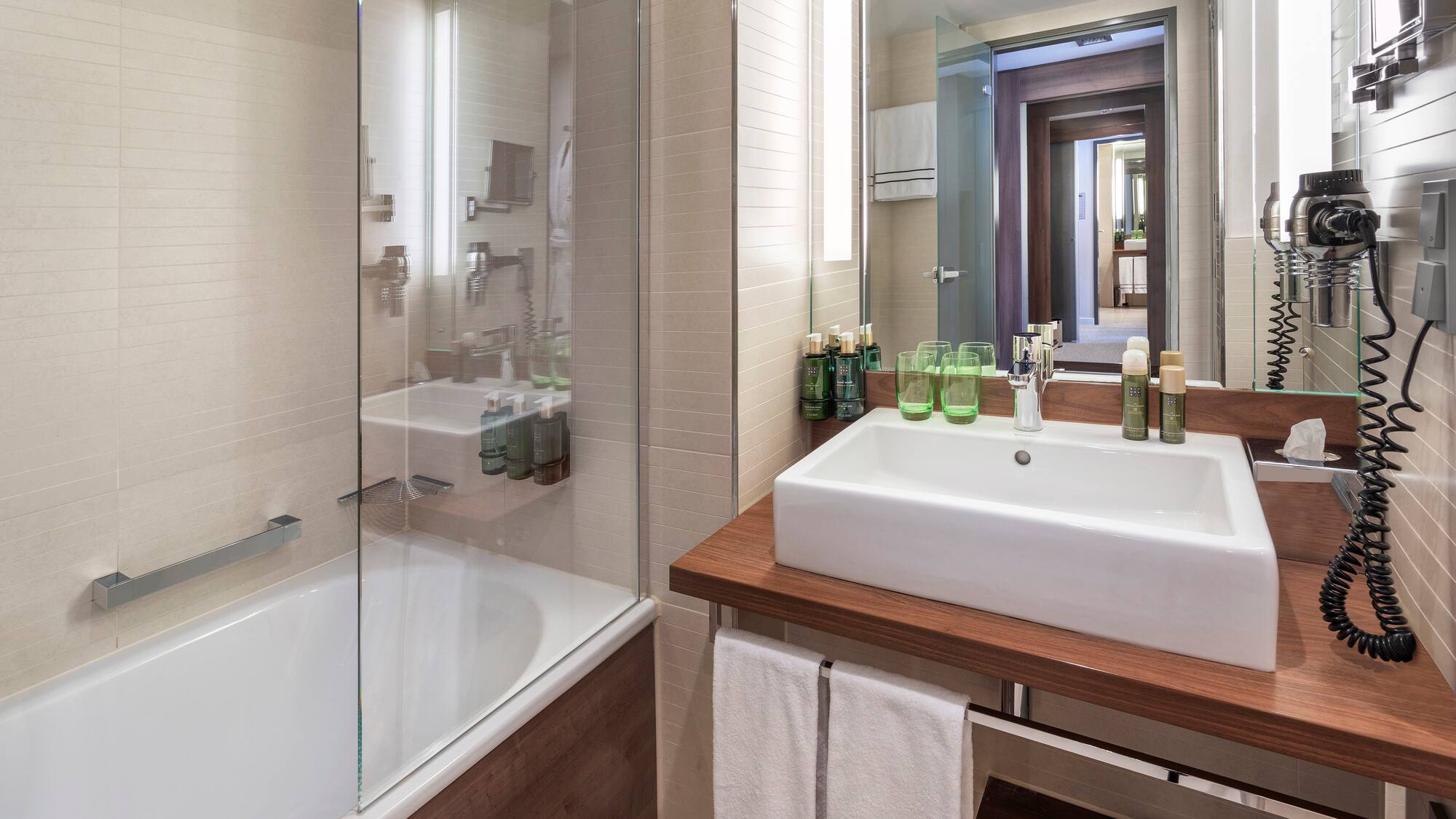 a bathroom with a sink and a shower