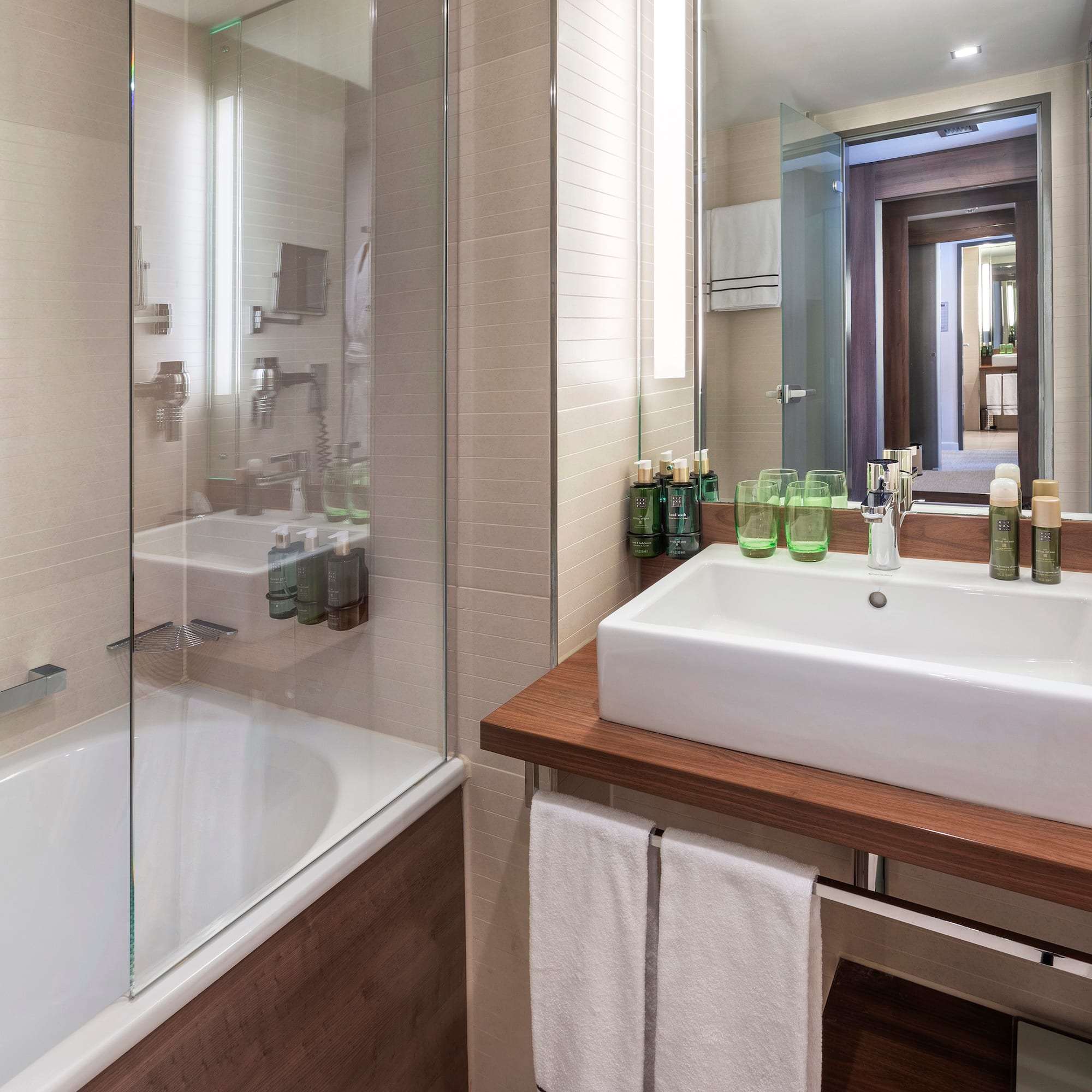 a bathroom with a sink and a shower