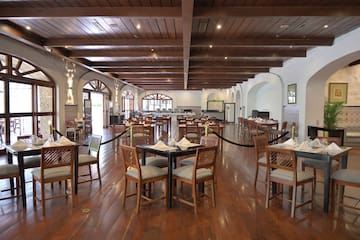 a room with tables and chairs