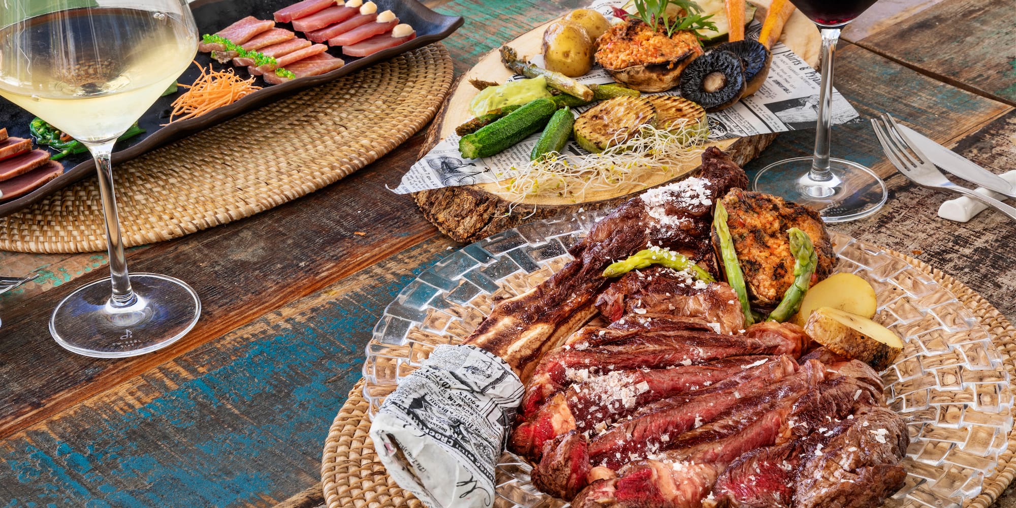 a plate of meat and vegetables on a table