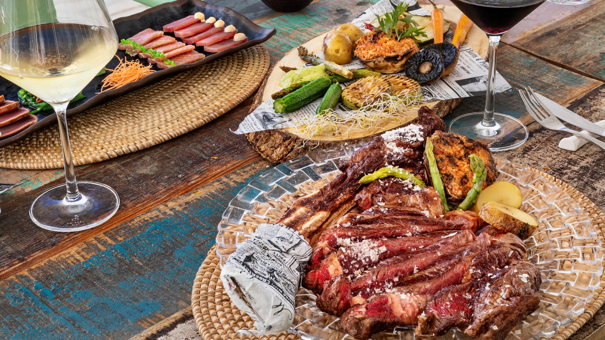 a plate of meat and vegetables on a table