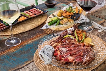 a plate of meat and vegetables on a table