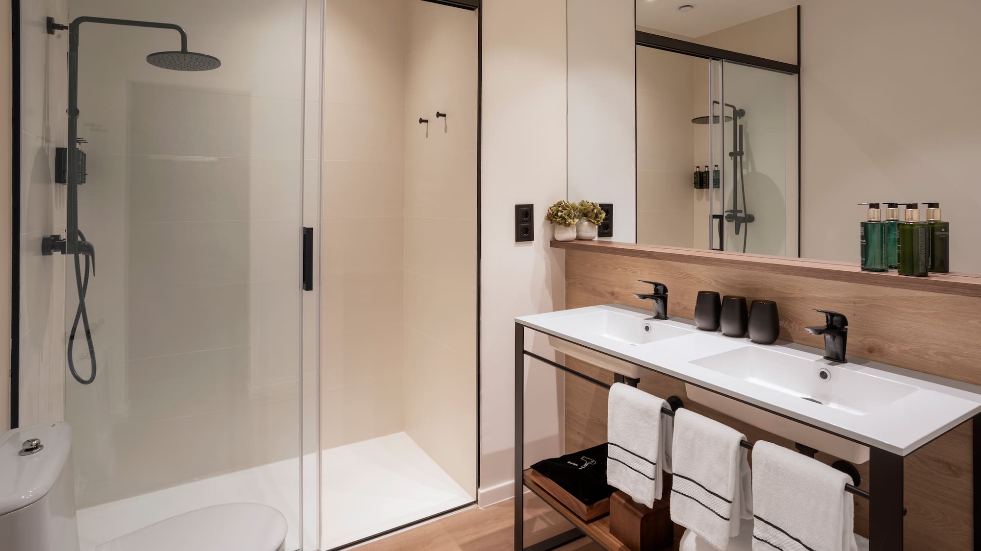 a bathroom with a shower and sink