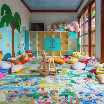 a room with many stuffed animals and toys