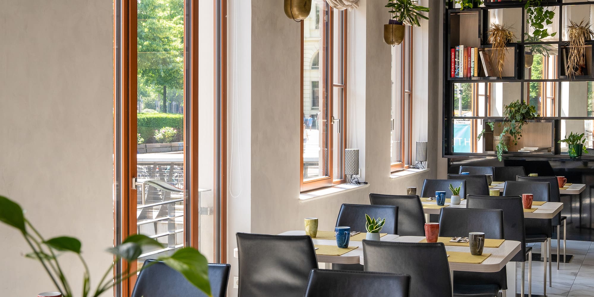 a room with tables and chairs