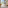 Modern hotel room with beach bag, straw hat, and sunny balcony overlooking green hills.