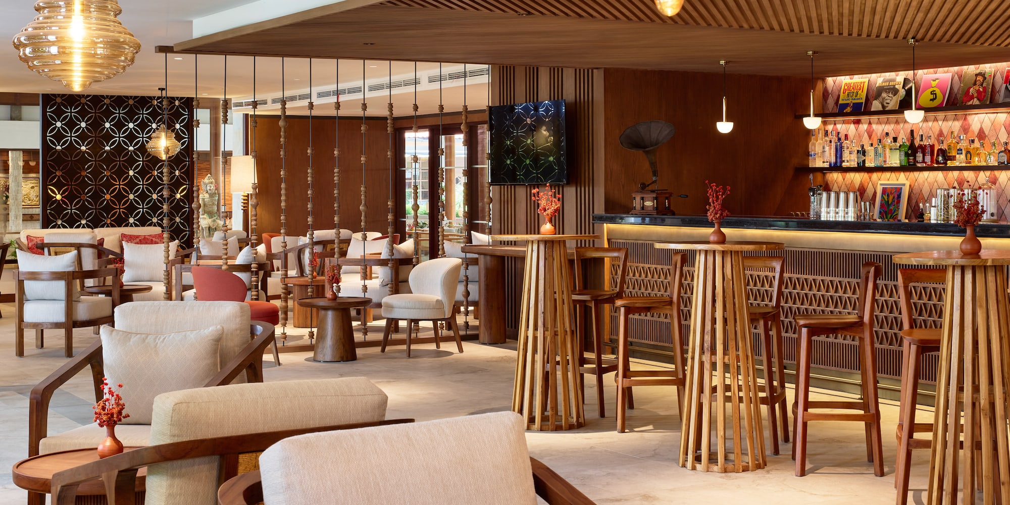 a room with a bar and chairs