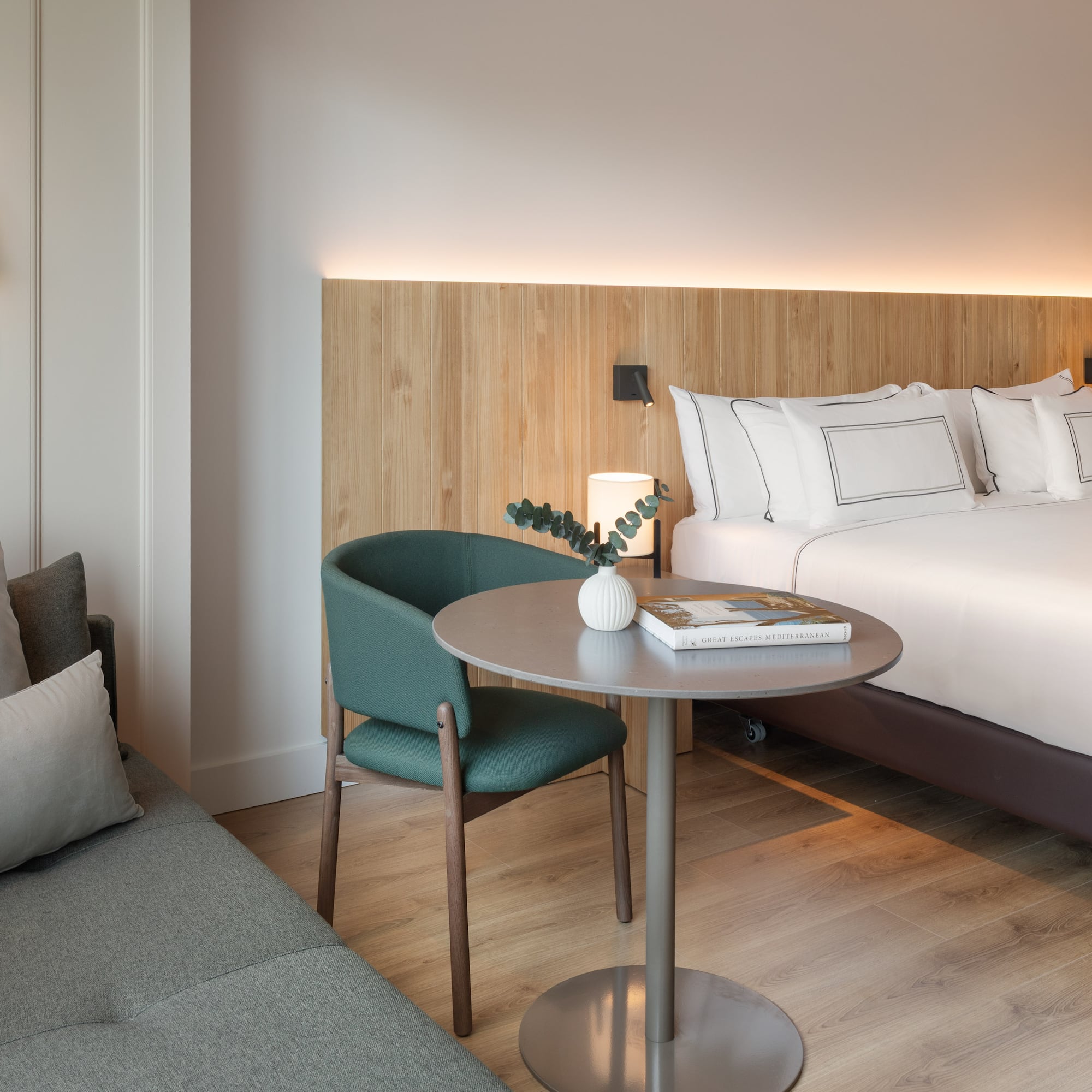 a room with a bed and a table