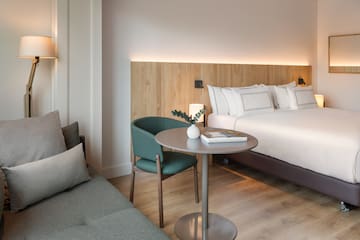 a room with a bed and a table