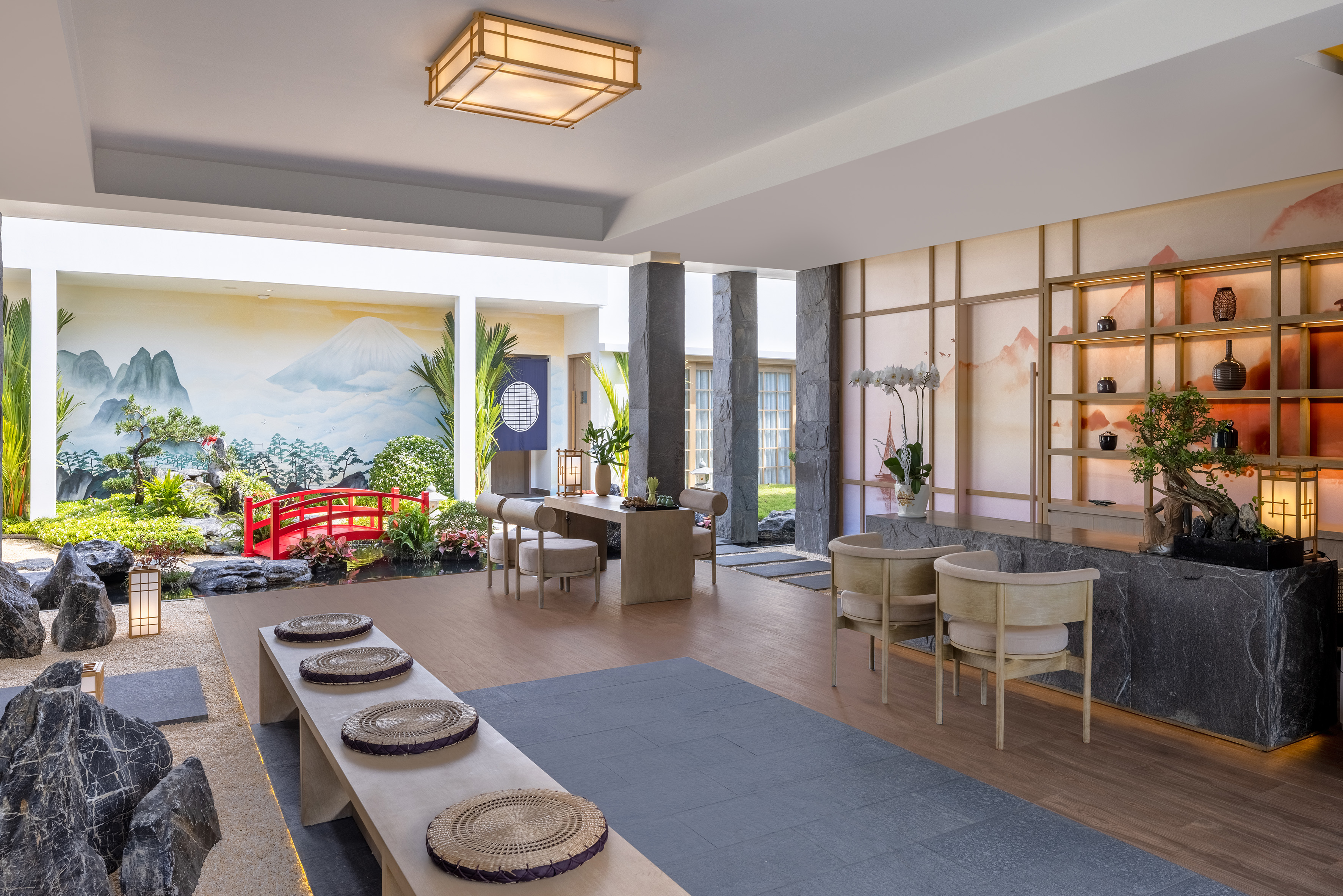 a room with a large window and a red bridge