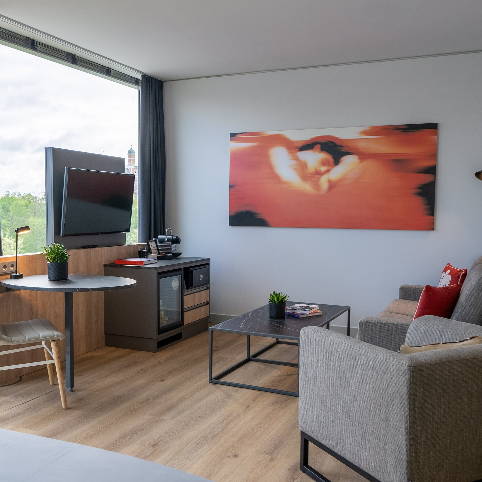 a living room with a couch and a table
