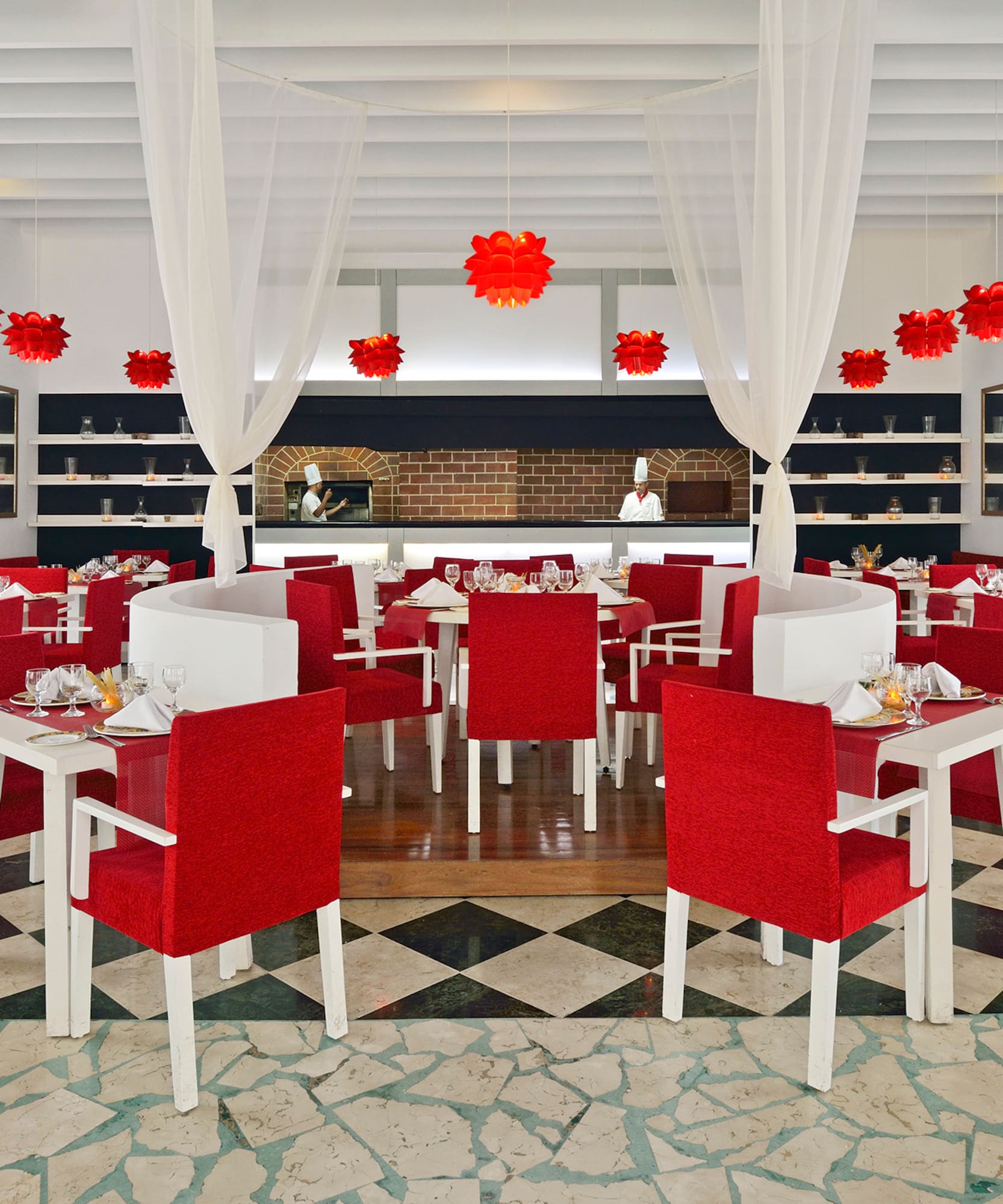 a restaurant with tables and chairs