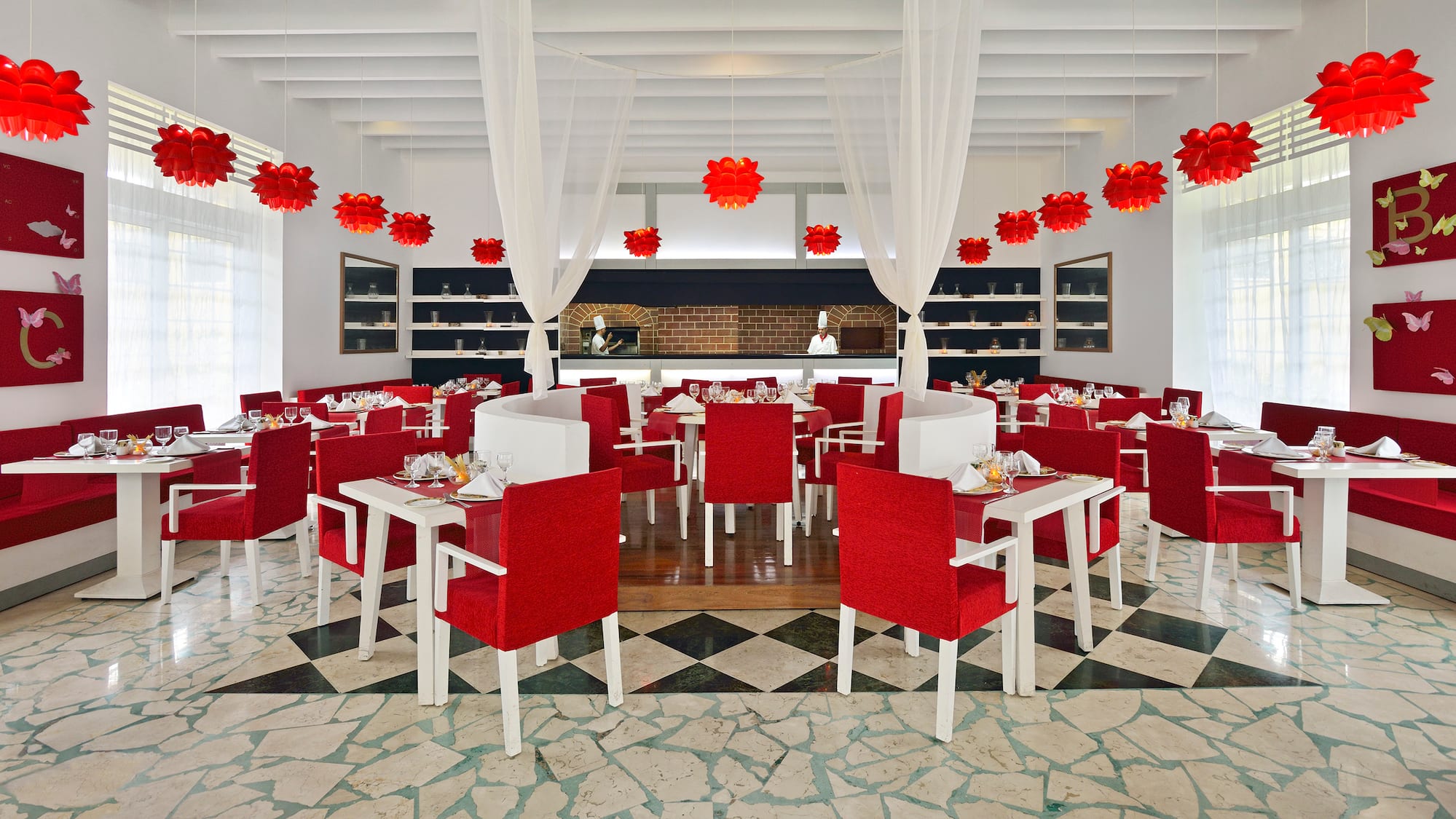 a restaurant with tables and chairs