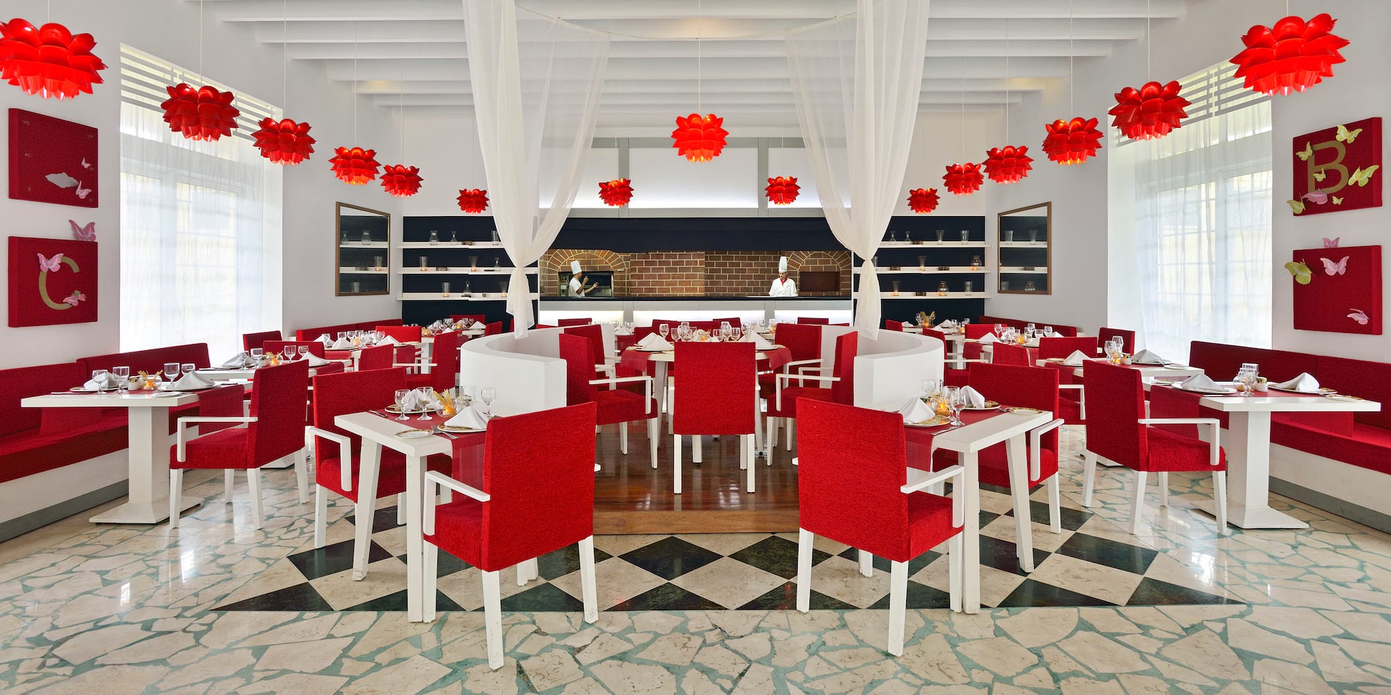 a restaurant with tables and chairs