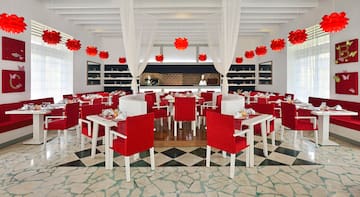 a restaurant with tables and chairs