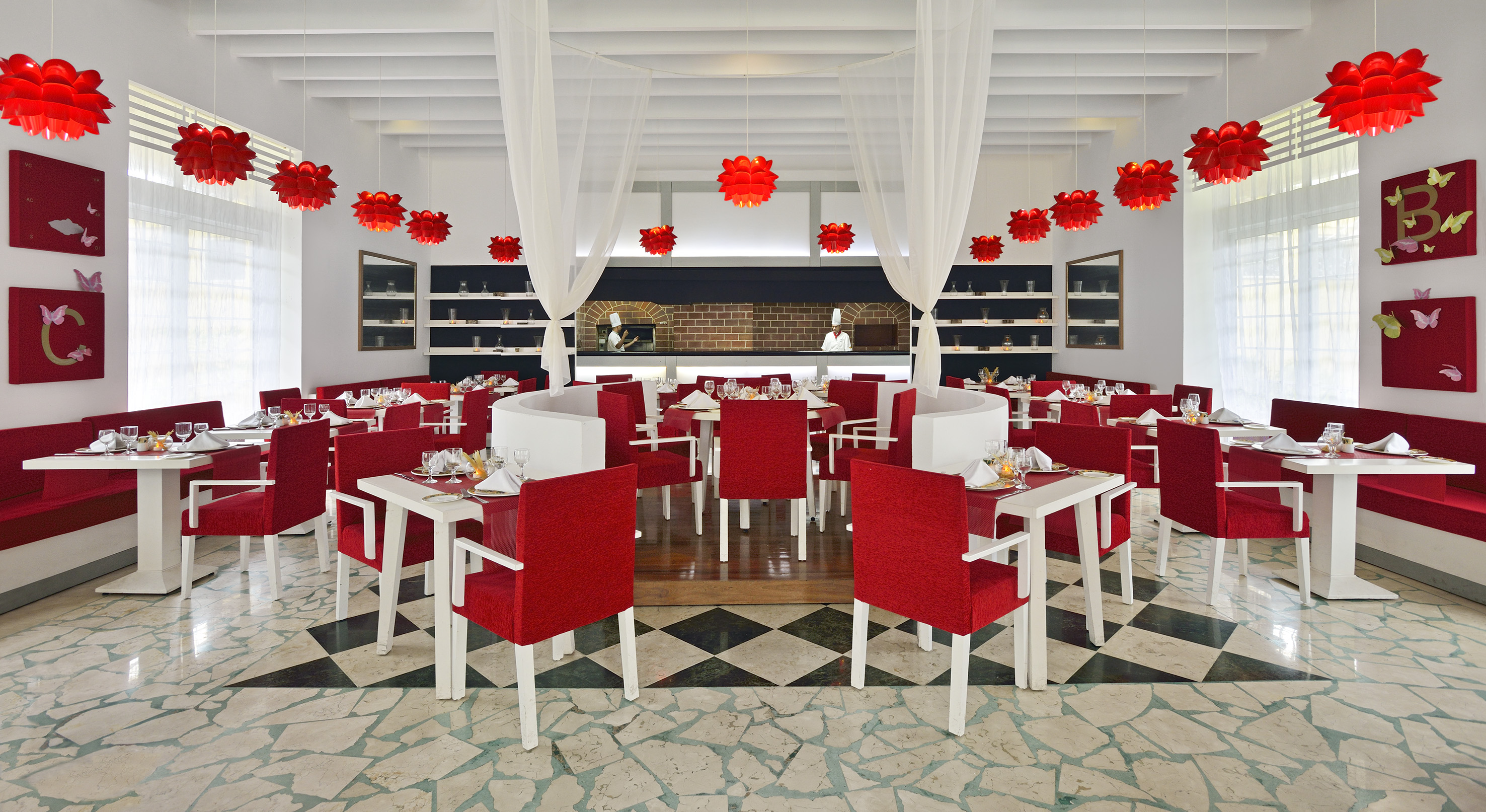 a restaurant with tables and chairs