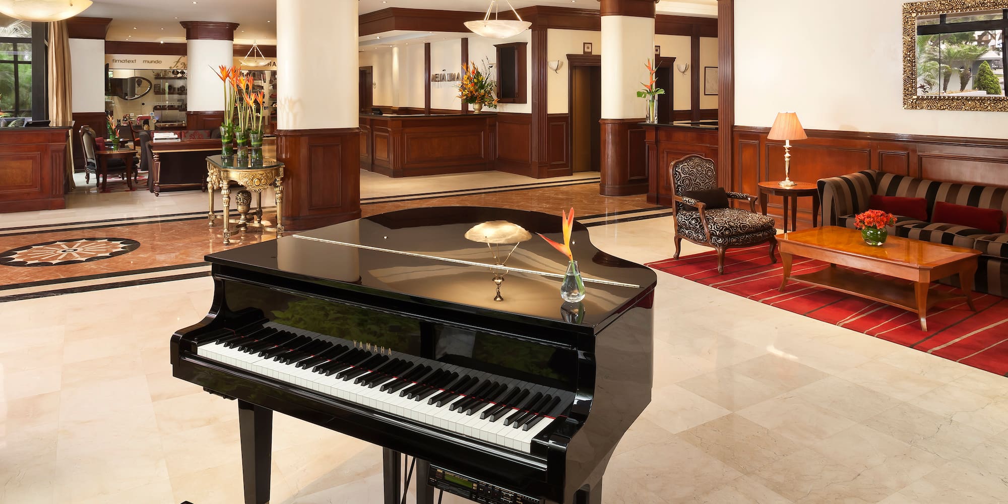 a piano in a hotel lobby