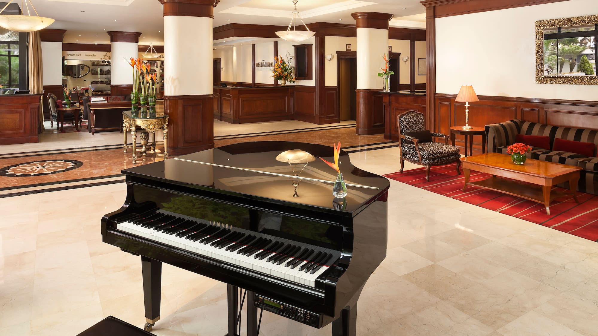 a piano in a hotel lobby