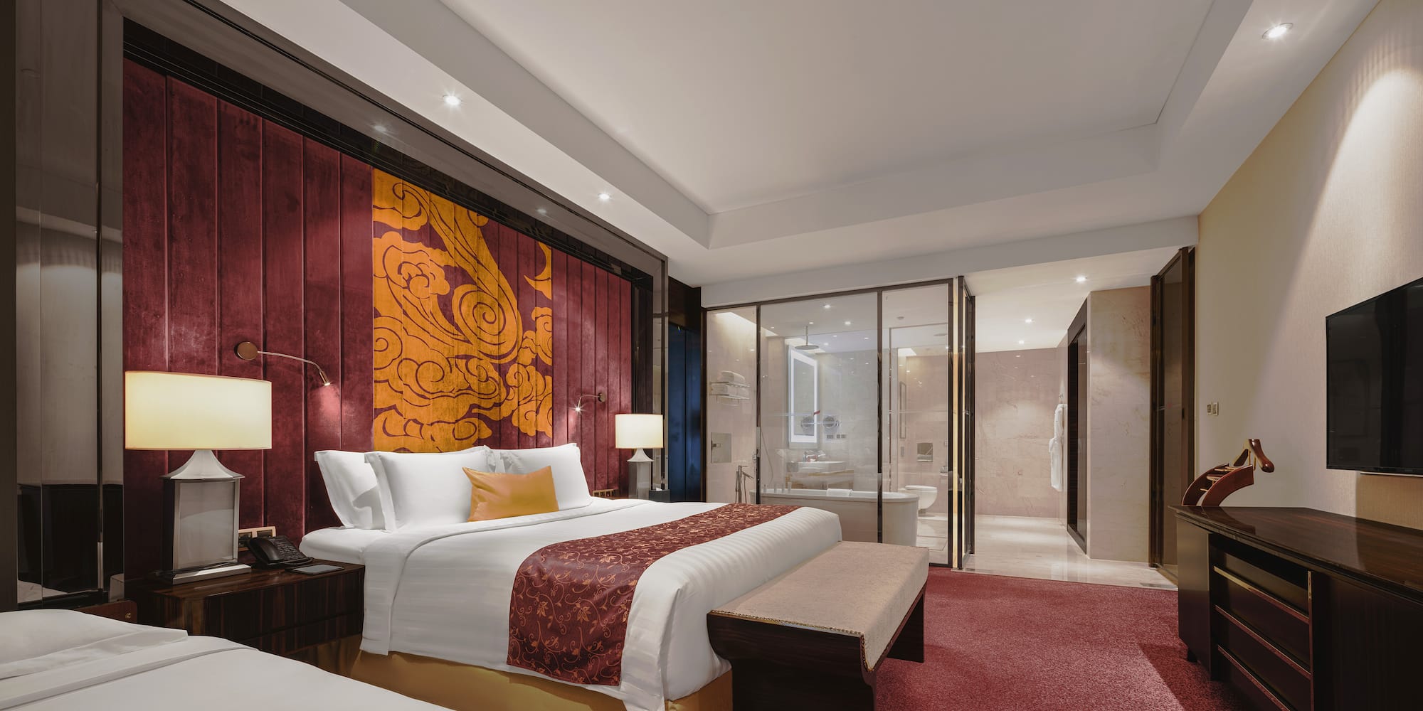 a room with a bed and a bathtub