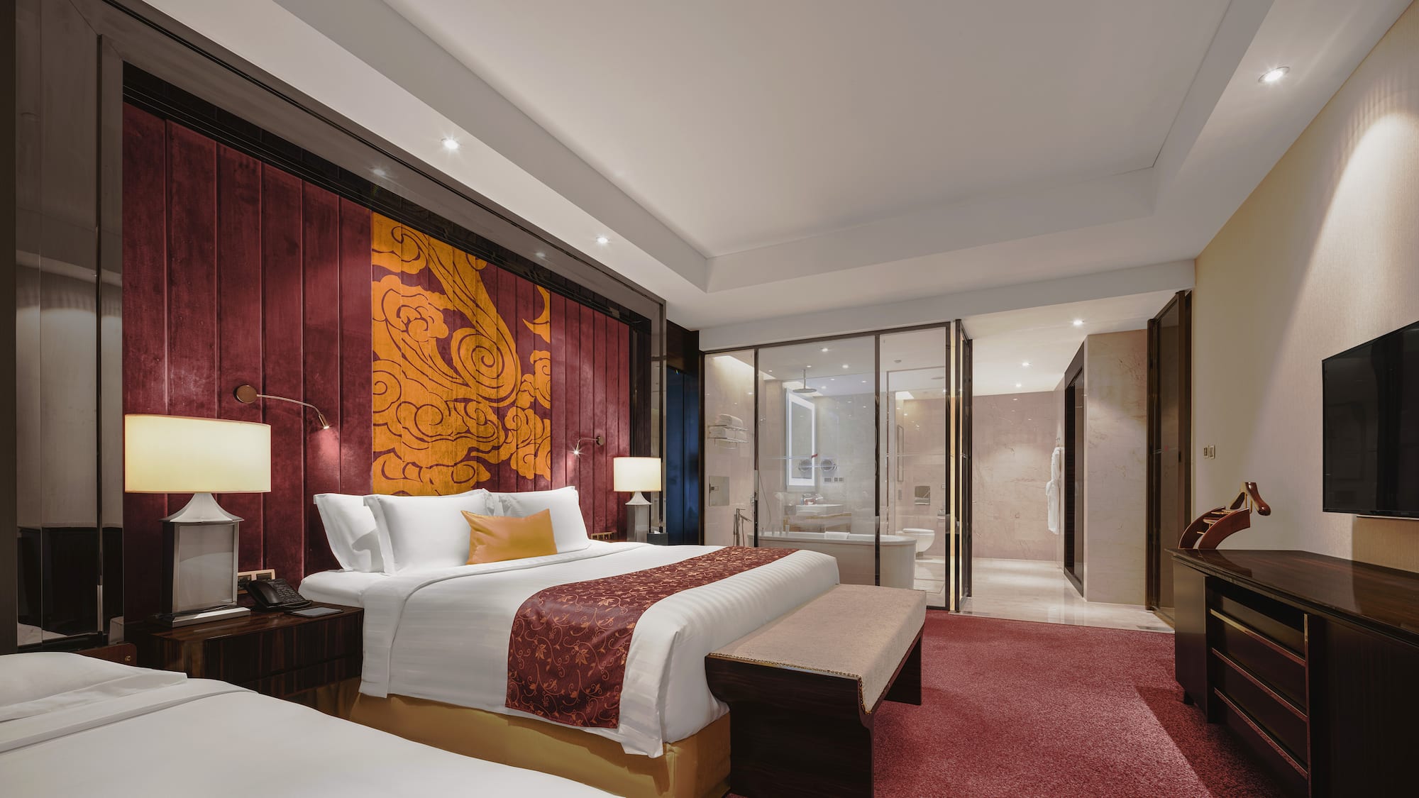 a room with a bed and a bathtub