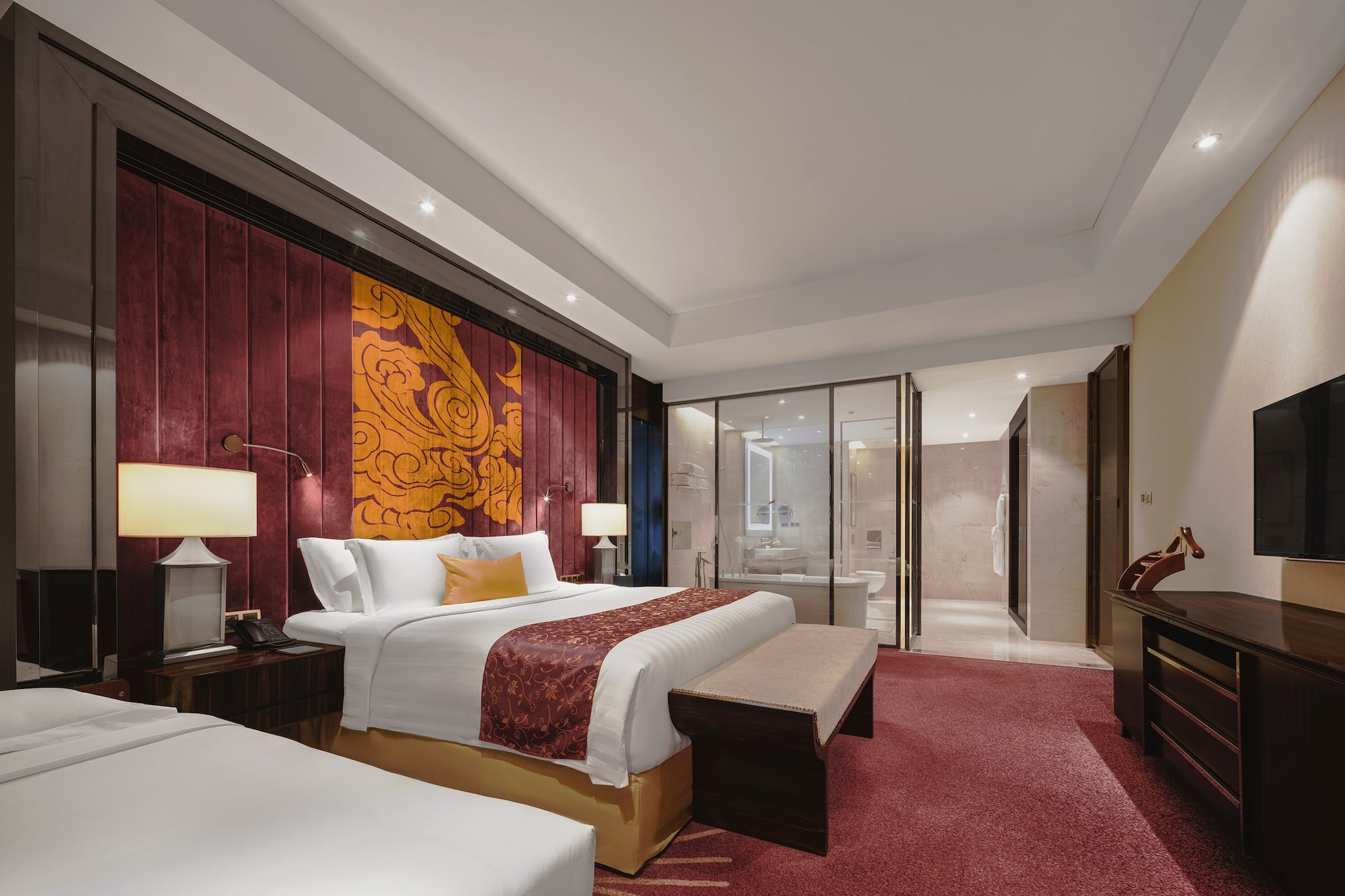 a room with a bed and a bathtub