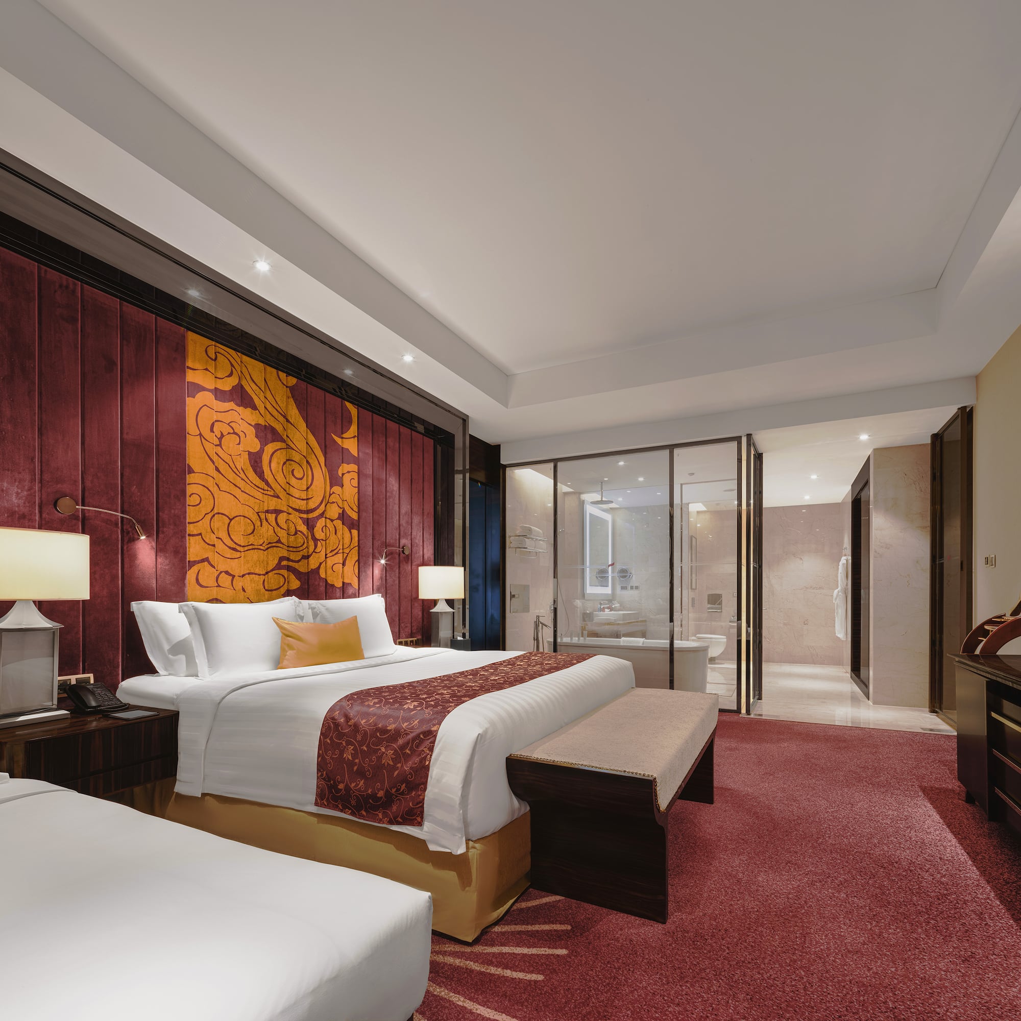 a room with a bed and a bathtub