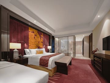 a room with a bed and a bathtub