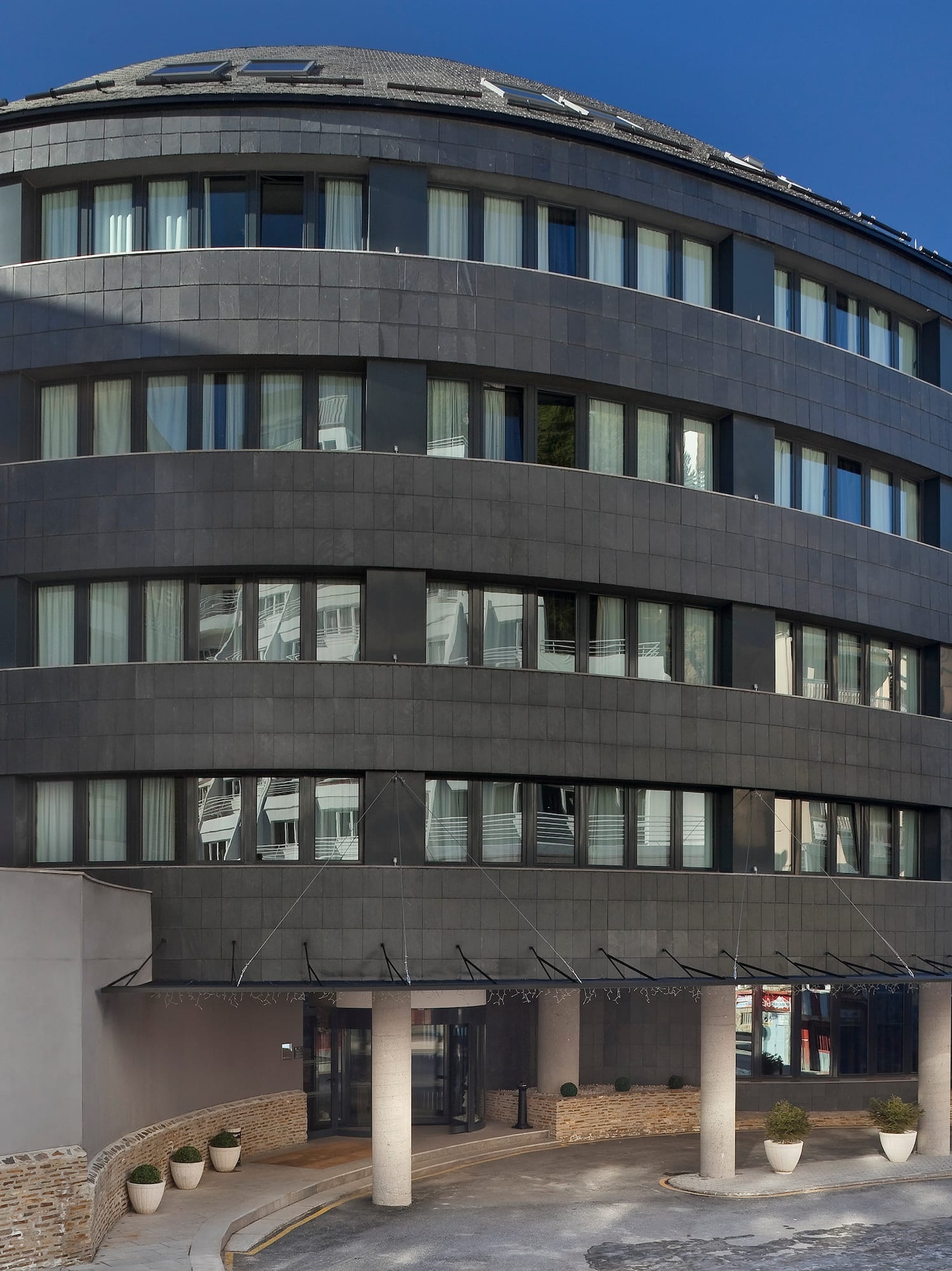 a circular building with many windows