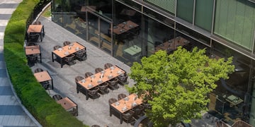 a building with tables and chairs