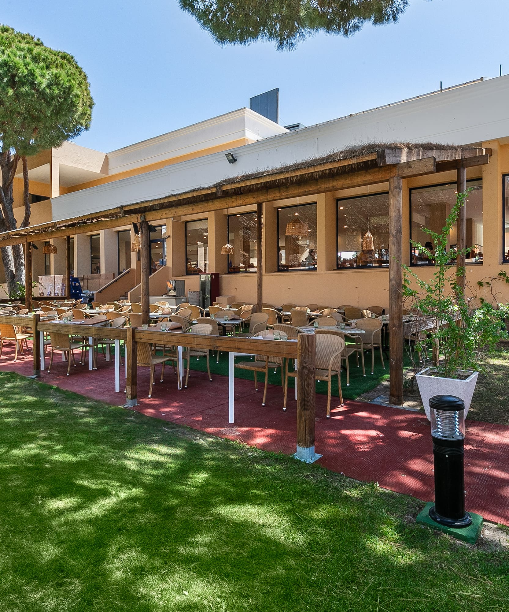 a building with tables and chairs outside