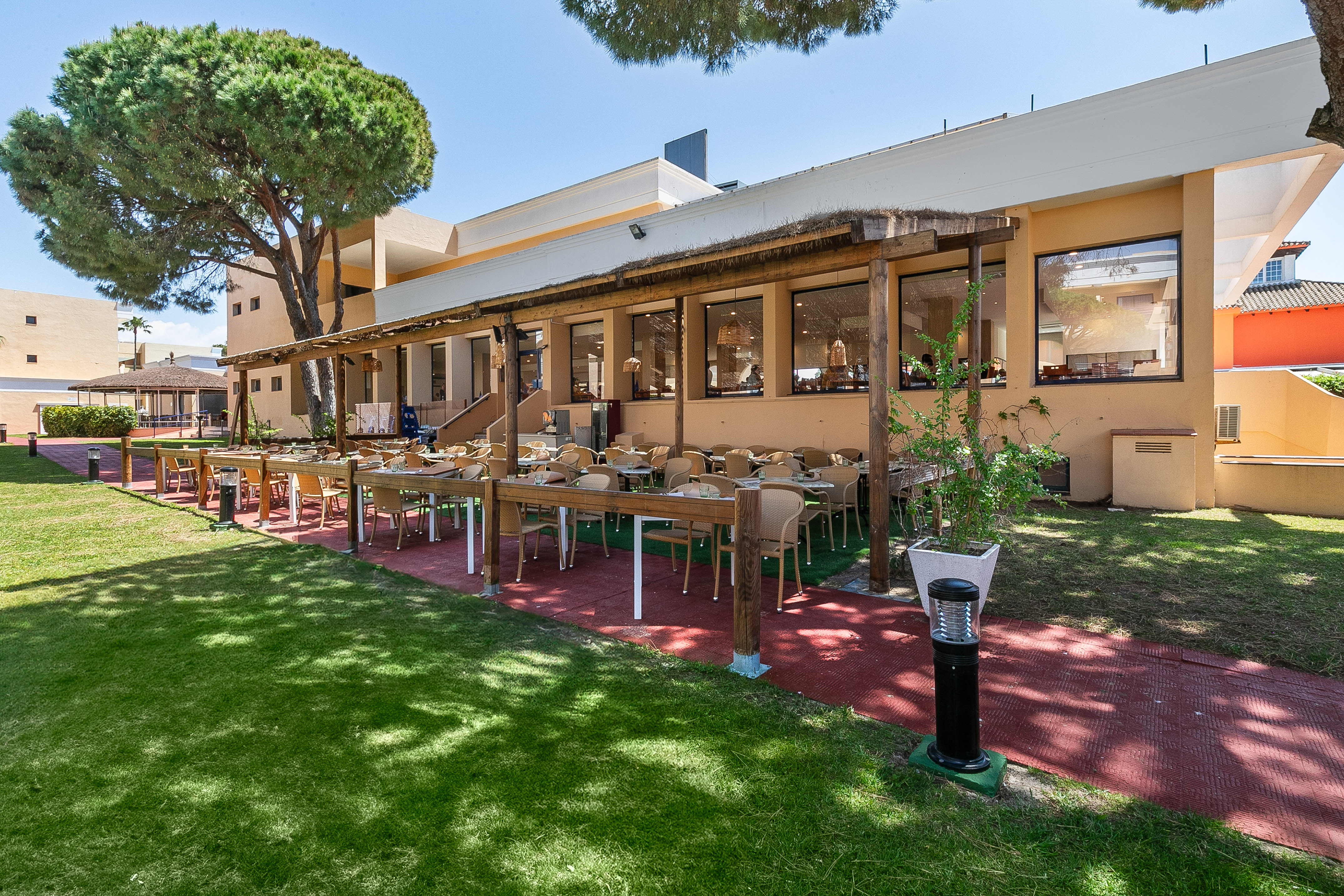 a building with tables and chairs outside